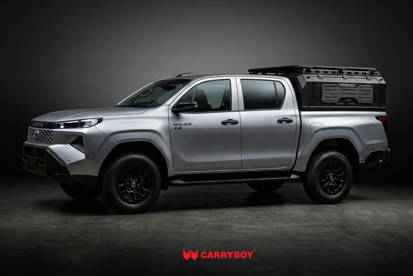 Carryboy Nomad canopy fitted on a Toyota Hilux, rear three-quarter view