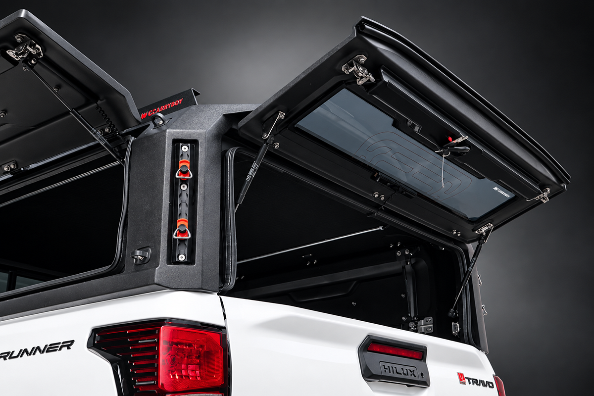 Nomad canopy rear three-quarter view on a silver Hilux